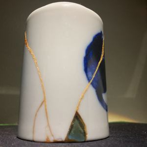 teacup repaired with seaglass